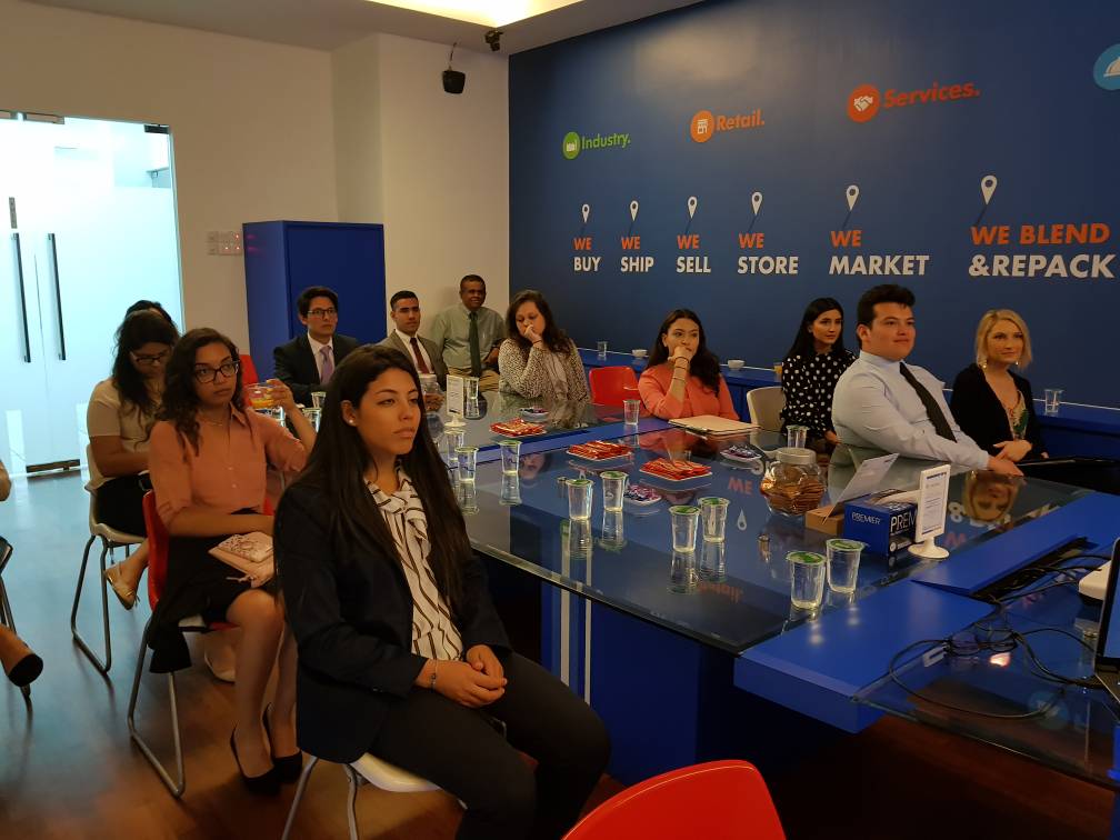 The Greehey School of Business from St. Mary University visits DPO International 2 gsob students listening to daniel pans